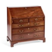 A GEORGE III MAHOGANY SLANT-FRONT BUREAU