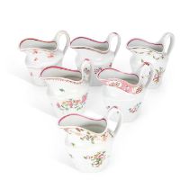 A COLLECTION OF SIX NEW HALL CREAM JUGS