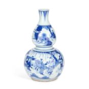 A CHINESE BLUE AND WHITE DOUBLE-GOURD VASE