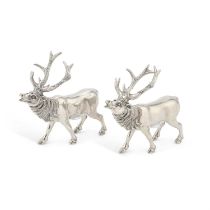 A PAIR OF SILVER-PLATED SALT AND PEPPER POTS