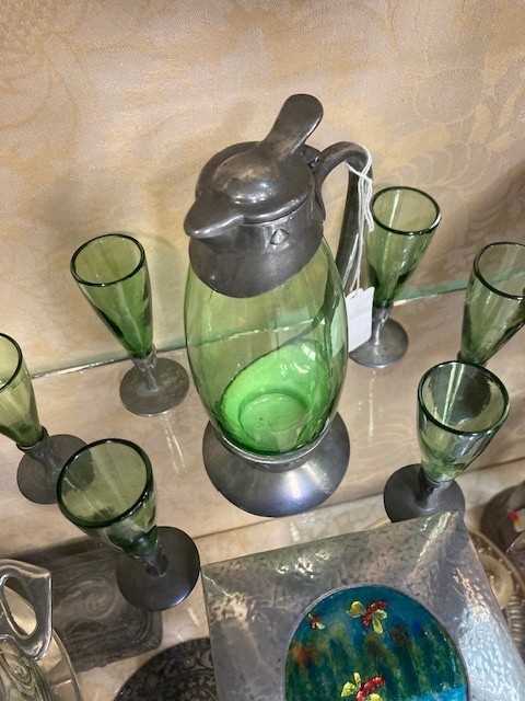 ARCHIBALD KNOX (1864-1933) FOR LIBERTY & CO A TUDRIC PEWTER AND GREEN GLASS DECANTER WITH SIX LIQUOR - Image 6 of 6