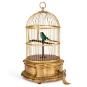 A CONTINENTAL SINGING BIRD AUTOMATON IN A GILT-METAL CAGE LATE 19TH/ EARLY 20TH CENTURY