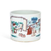 A CHINESE DOUCAI PORCELAIN BRUSH POT WITH A REEDED RIM