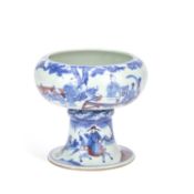A CHINESE BLUE, WHITE AND UNDERGLAZE-RED PORCELAIN PEDESTAL CENSER