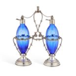 A PAIR OF ITALIAN SILVER-MOUNTED BLUE GLASS OIL AND VINEGAR CRUETS