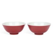 A PAIR OF CHINESE PORCELAIN RUBY-GROUND BOWLS