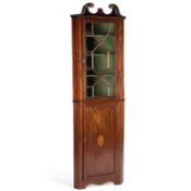 AN EDWARDIAN INLAID MAHOGANY FLOOR-STANDING CORNER CABINET