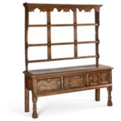 AN OAK DRESSER AND RACK