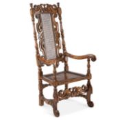A CAROLEAN STYLE CARVED WALNUT HIGH-BACK CHAIR