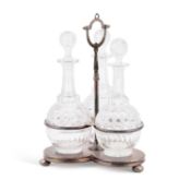 A VICTORIAN SILVER-PLATED THREE-BOTTLE DECANTER STAND