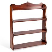 A SET OF 19TH CENTURY MAHOGANY WATERFALL HANGING SHELVES