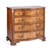 A GEORGE III STYLE MAHOGANY SERPENTINE CHEST OF DRAWERS
