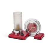 AN ART DECO CHERRY AMBER BAKELITE AND CHROME COMBINATION DESK CLOCK AND LAMP