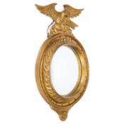 A SMALL 19TH CENTURY GILTWOOD CONVEX MIRROR