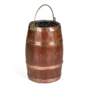 A BRASS AND COPPER MOUNTED OAK BARREL-FORM COAL BUCKET
