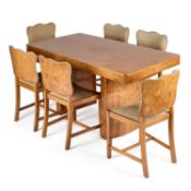 AN ART DECO BURR MAPLE DINING TABLE AND SIX CHAIRS ATTRIBUTED TO EPSTEIN