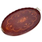 AN EDWARDIAN INLAID MAHOGANY TWO-HANDLED OVAL TRAY