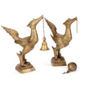 A PAIR OF THAI BRASS FIGURES OF MYTHICAL BIRDS WITH BELL PENDANTS