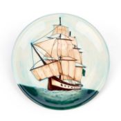 A LARGE MOORCROFT POTTERY LIMITED EDITION CHARGER H.M.S. SIRIUS