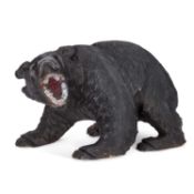 A LARGE BLACK FOREST STYLE CARVED BEAR