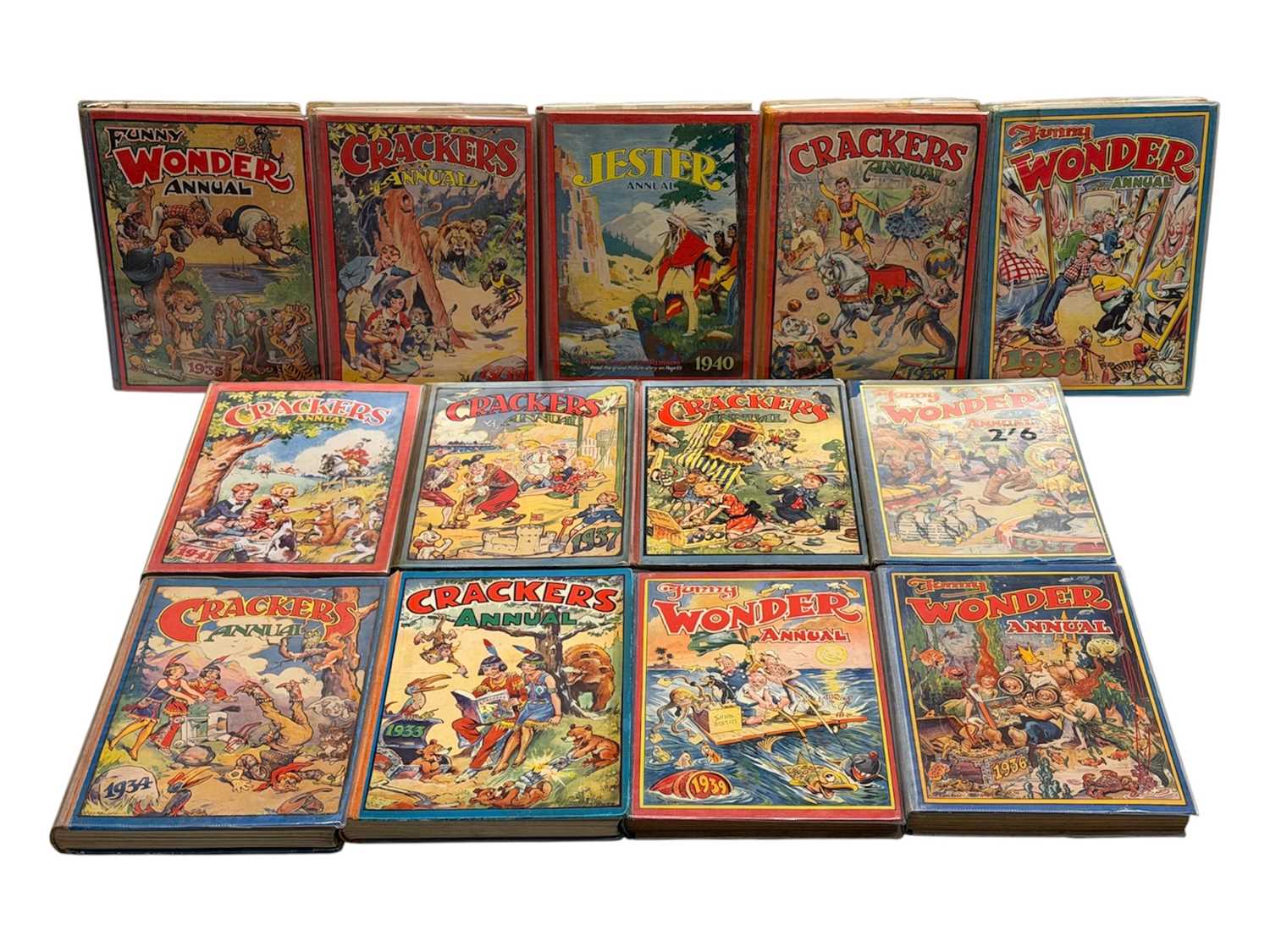 A selection of vintage hardback comic annuals comprising CRACKERS ...