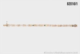 Goldarmband 585 GG, mit 2 Smaragden ca. 0,08 ct und 1 Diamant ca. 0,05 ct, w-si, ca. ...