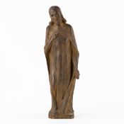 Jesus Christ with the Sacred Heart, a modernist bronze statue.