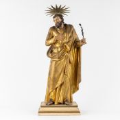 Saint Joseph, a Wood-Sculptured Statue with a Sunburst Halo and a Floral Branch, Patinated and Gilde