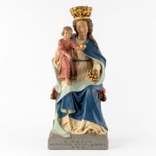 Mary Mediatrix, a polychrome patinated plaster statue.
