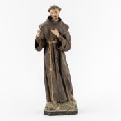 Saint Francis of Assisi, patinated papier-mâché.