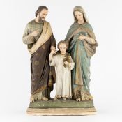The Holy Family, a polychrome patinated plaster statue.