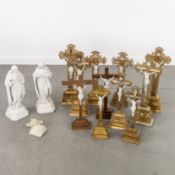 A Collection of 11 altar crucifixes with biscuit porcelain Corpus Christi, two Sacred Heart sculptur