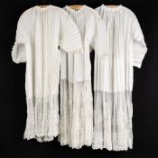 Lithurgical Vestments: Three Albes, finished with Bruges and Lierse lace. Handmade lace and cotton.