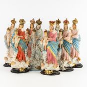 Eight 'Crowned Madonna' patinated plaster.
