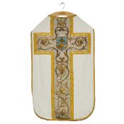 A Roman chasuble, made of thick gold brocade with an image of ‘The Franciscans’.