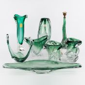 Val Saint Lambert and Murano, a collection of 8 pieces of dark green colored crystal, with 5 vases, 