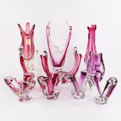 Val Saint Lambert and Murano, a collection of 10 pieces of red and amethyst-coloured crystal, with 5