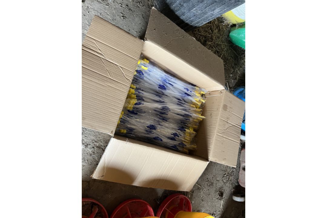Part box of 100+ pig AI catheters