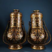 Bronze vase with gold and silver inlay and handle