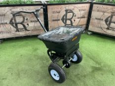 Vevor Push Operated seed  Spreader with weatherproof cover.