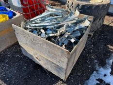 Crate of assorted hangers