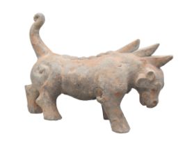 A CHINESE GREY POTTERY MODEL OF A MYTHICAL BEAST HAN DYNASTY
