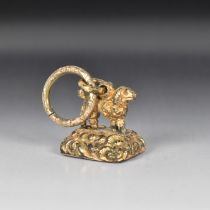 A GILT-METAL NOVELTY 'DOG' FOB SEAL 19TH CENTURY