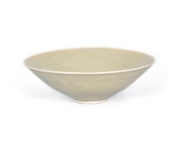 A CHINESE INCISED HUANGPU CELADON BOWL FIVE DYNASTIES, 10TH CENTURY