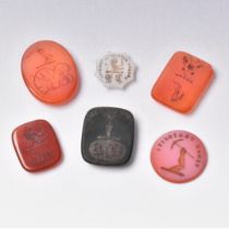 A COLLECTION OF SIX GEM-STONE ARMORIAL SEAL MATRIXES