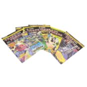 Marvel Comics: A collection of 80s-era Transformers comics and posters