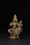 A SOUTHERN INDIAN BRONZE FIGURE OF UMA-MAHESHVARA, 18TH/19TH CENTURY.