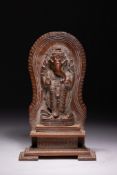 A SOUTH INDIAN CARVED HARDWOOD RELIEF SCULPTURE OF GANESHA, 20TH CENTURY.