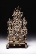 A SOUTH INDIAN COPPER ALLOY SHRINE OF VISHNU AND THE DASHAVATARA, 18TH-19TH CENTURY.