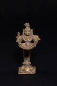 A SOUTHERN INDIAN FOLK STYLE BRONZE DEEPALAKSHMI OIL LAMP, LATE 19TH/EARLY 20TH CENTURY